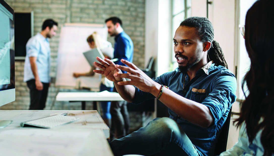 A professional communicating his thoughts
